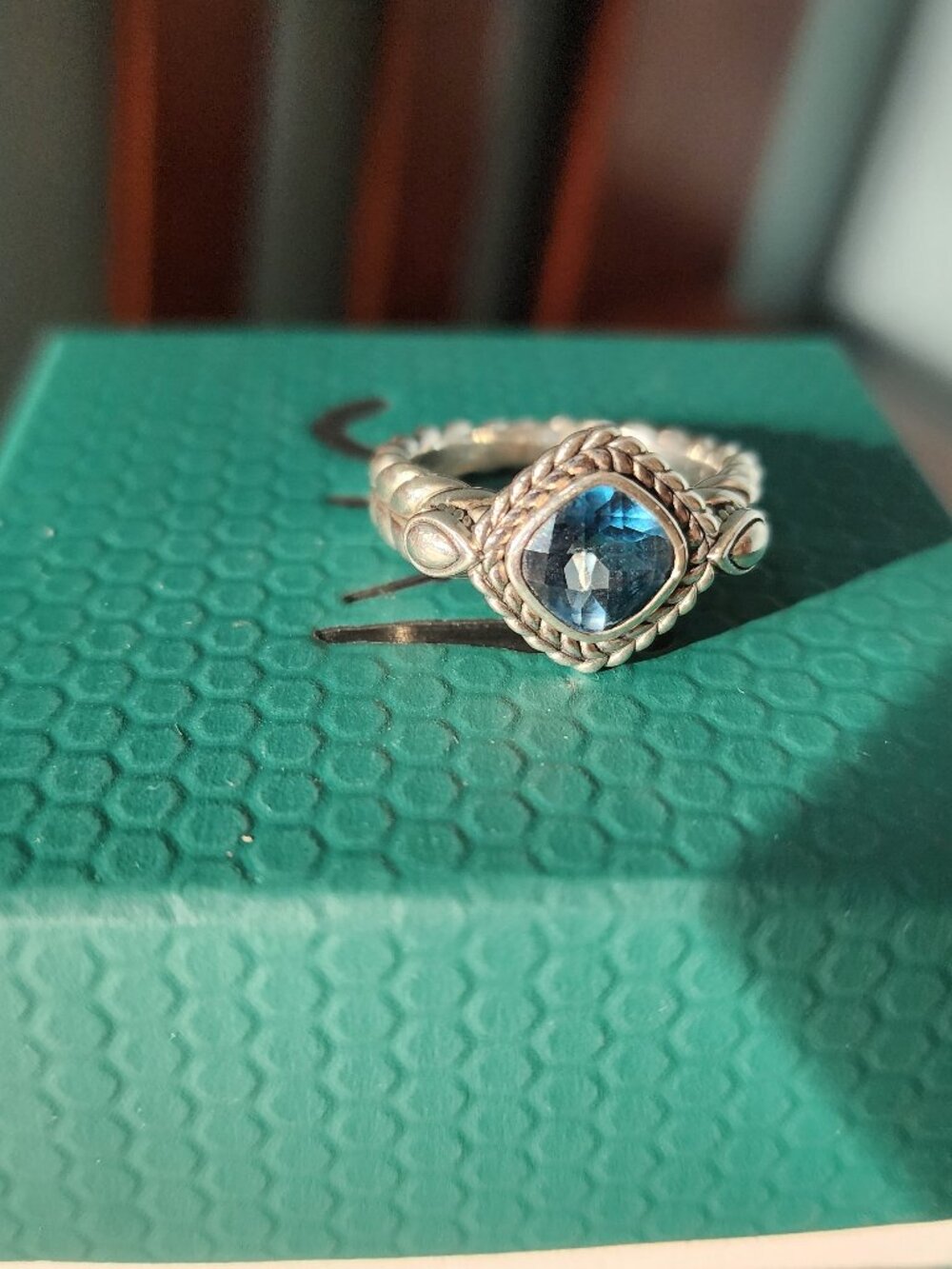 JAI Bezel-set, cushion-cut, faceted London blue topaz ring